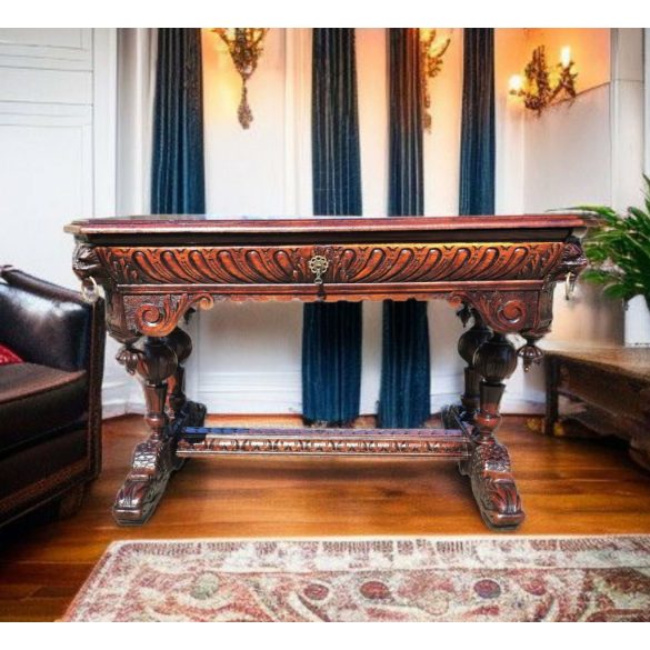 Antik,frissen felújított reneszánsz stílusú,dúsan faragott íróasztal